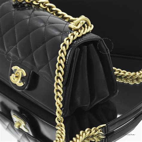 black Chanel bag gold hardware